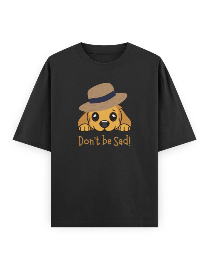 Black oversized t-shirt with a cute dog in hat graphic and 'Don't be Sad!' text