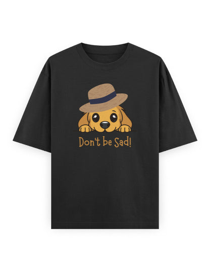 Black oversized t-shirt with a cute dog in hat graphic and 'Don't be Sad!' text