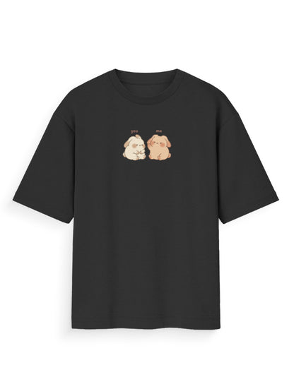 Black oversized t-shirt with cute cartoon bunnies and 'you me' text graphic on front
