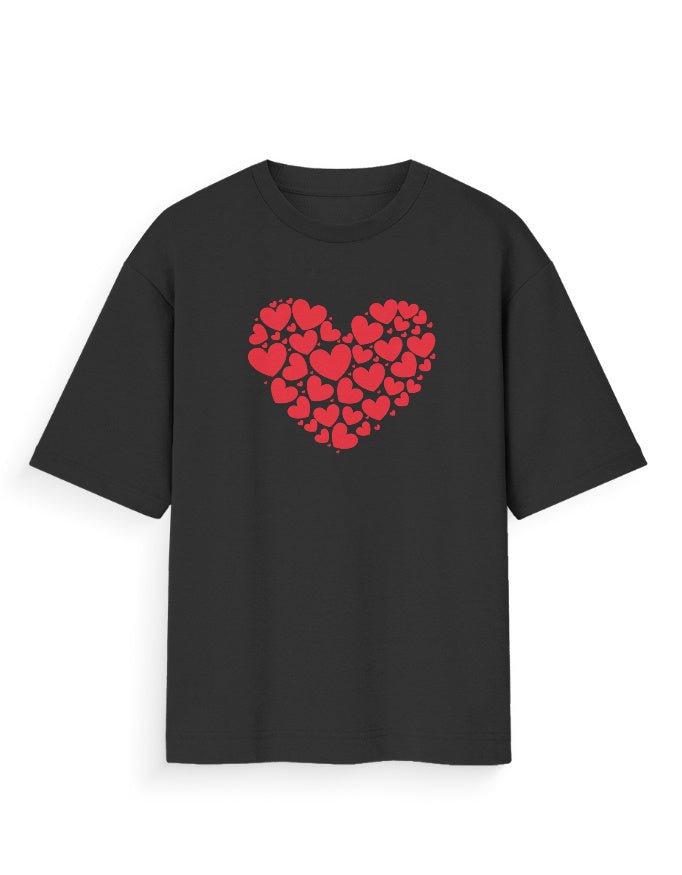 Black oversized t-shirt with red heart graphic made of smaller hearts, streetwear style