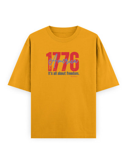 Yellow oversized t-shirt with '1776 America It’s all about freedom' graphic text print
