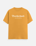 A mustard yellow short-sleeve t-shirt with the word 'DISCIPLINE' printed in white across the chest, displayed on a clean, light gray background.