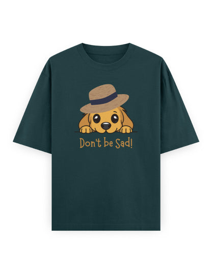 Oversized dark green t-shirt with cartoon dog in a hat and 'Don't be Sad!' text on front