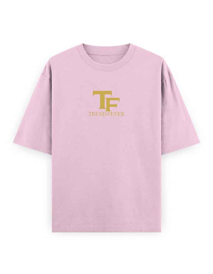 Light pink oversized streetwear t-shirt with gold TF Trend Fever logo on chest