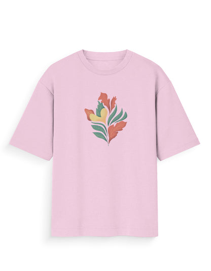 Light pink oversized t-shirt with colorful abstract leaf print on front