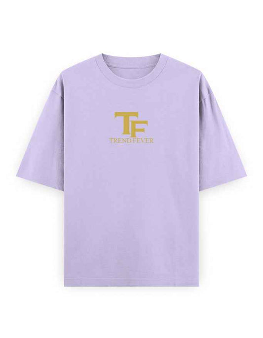 Light purple oversized t-shirt with gold TF Trend Fever logo on front, streetwear fashion