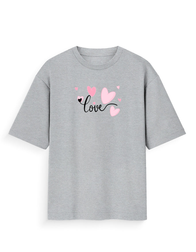 Grey oversized t-shirt with 'love' text and pink heart graphics, streetwear fashion