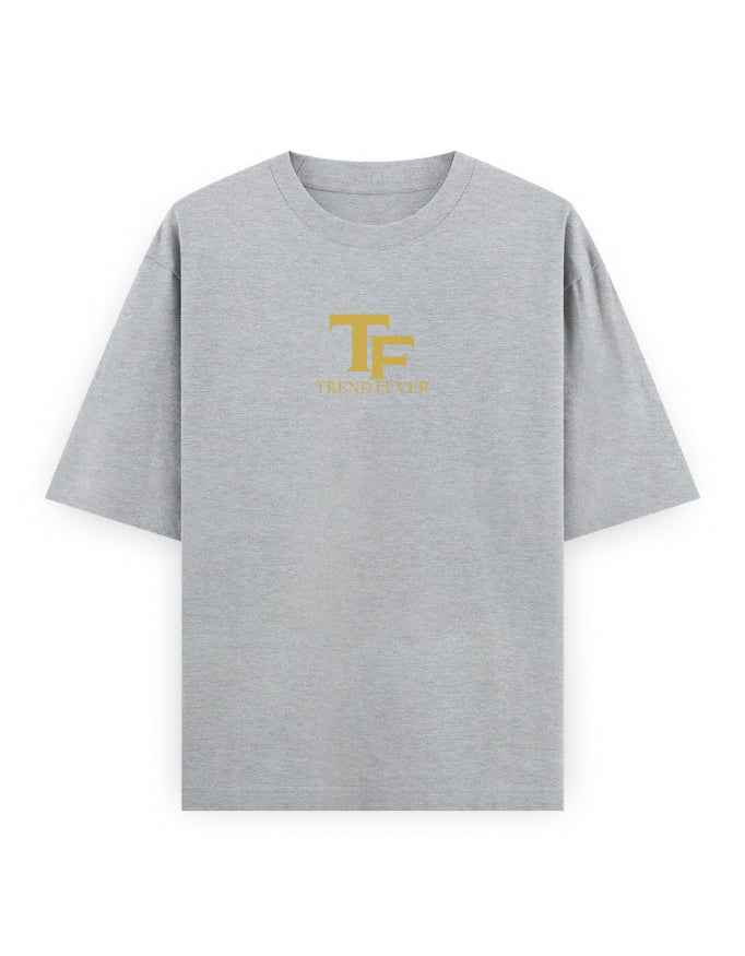 Grey oversized streetwear t-shirt with yellow TF logo and text on chest