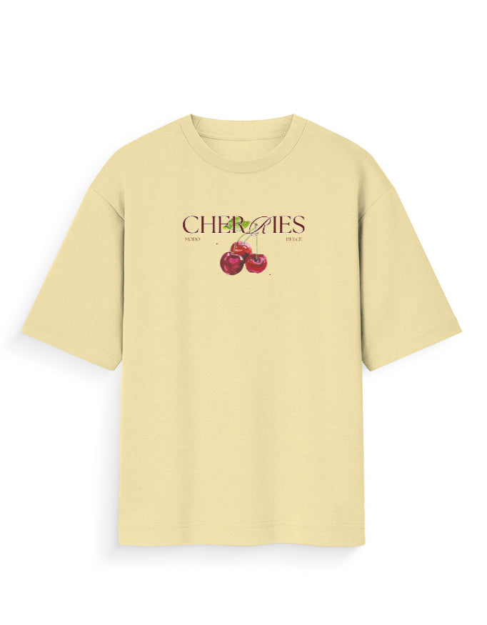 Beige oversized t-shirt with cherries graphic and bold text on front, streetwear style