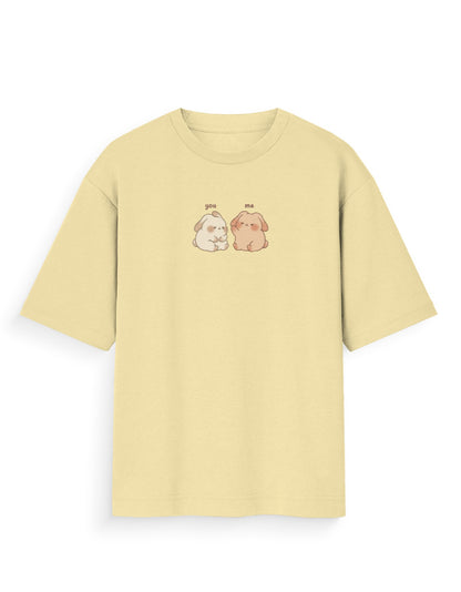 Oversized beige t-shirt with cute dog graphic and 'you me' text, streetwear fashion