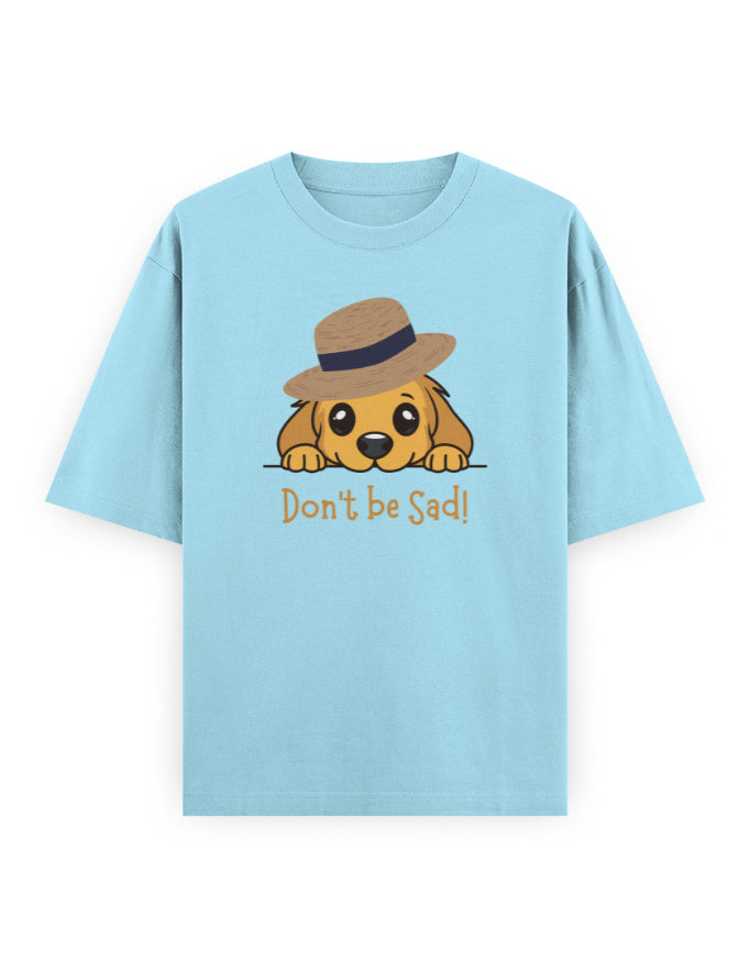 Light blue oversized t-shirt with cute dog in a hat and 'Don't be Sad!' graphic print