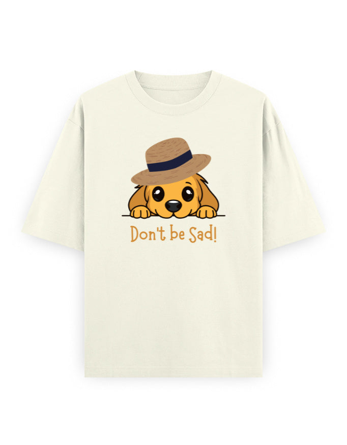Oversized white streetwear t-shirt with cute cartoon dog in hat and 'Don't be Sad!' text