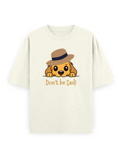 Oversized white streetwear t-shirt with cute cartoon dog in hat and 'Don't be Sad!' text