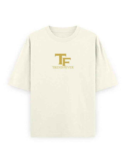 Oversized beige streetwear t-shirt with gold TF Trend Fever logo on front
