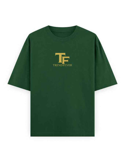 Dark green oversized t-shirt with gold 'TF Trend Fever' logo on front, streetwear style
