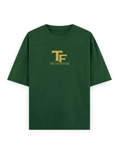 Green oversized t-shirt with bold yellow TF Trend Fever logo on front, streetwear fashion