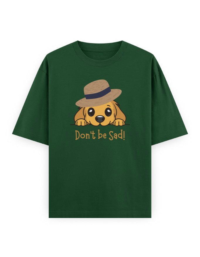 Oversized green streetwear t-shirt with cartoon dog in hat and 'Don't be Sad!' text