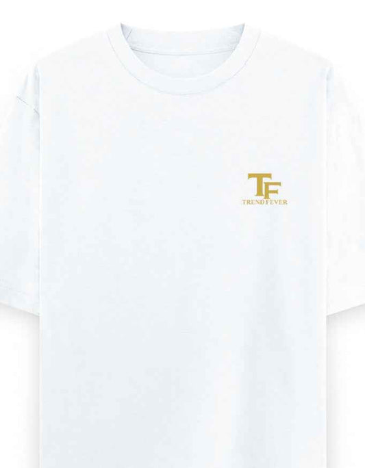 White oversized t-shirt with gold TF logo and Trend Fever text on left chest