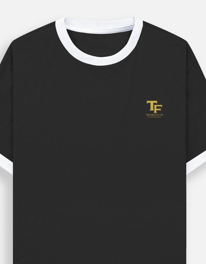 Black Trend Fever t-shirt with 'Courage' embroidery on a light green background