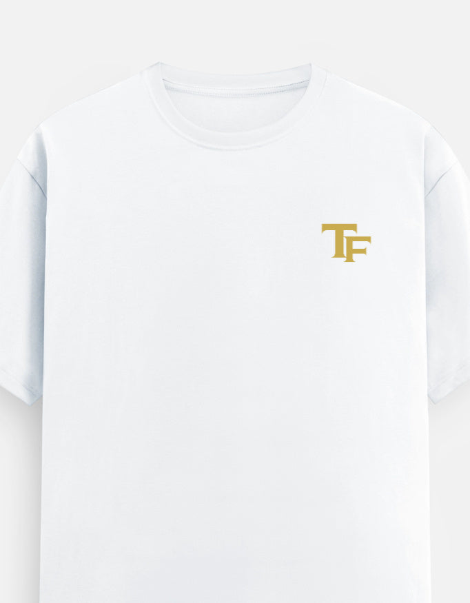 A white TREND FEVER short-sleeve crewneck t-shirt featuring a small gold 'TF' monogram logo on the left chest, displayed against a clean white background.