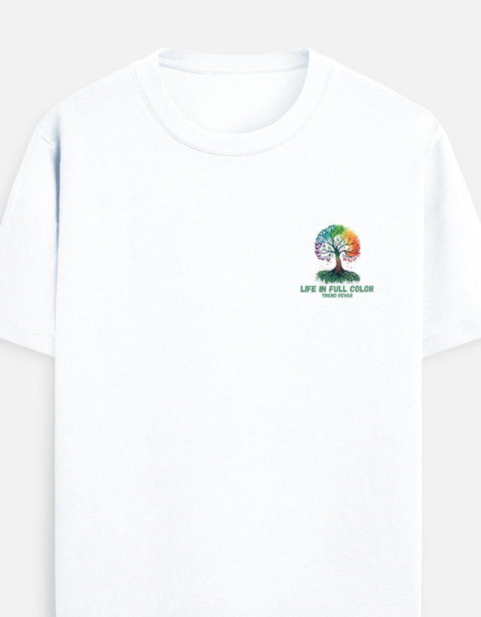 A white short-sleeve crewneck t-shirt featuring a colorful tree graphic on the left chest with the text 'LIFE IN FULL COLOR' and 'TODAY!' underneath, by TREND FEVER
