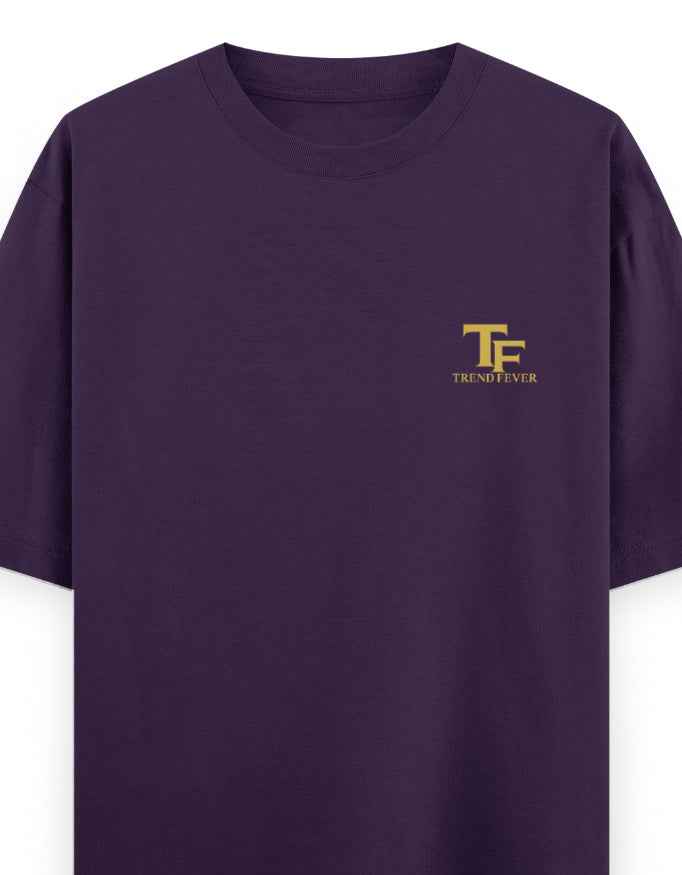 Purple oversized t-shirt with yellow TF Trend Fever logo on left chest
