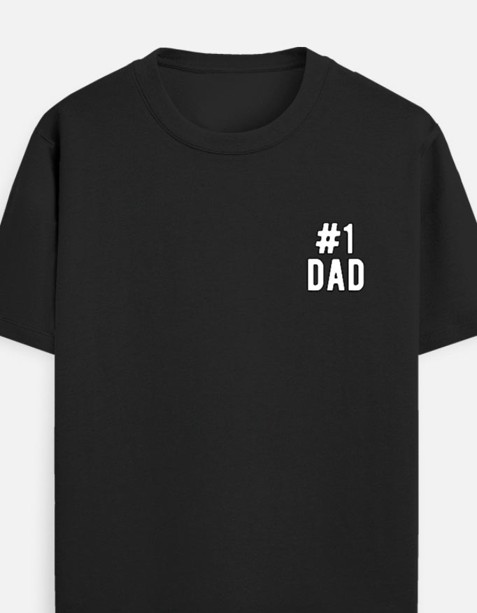 A white short-sleeve crewneck t-shirt featuring a small black outline graphic on the left chest that reads '#1 DAD' by TREND FEVER 