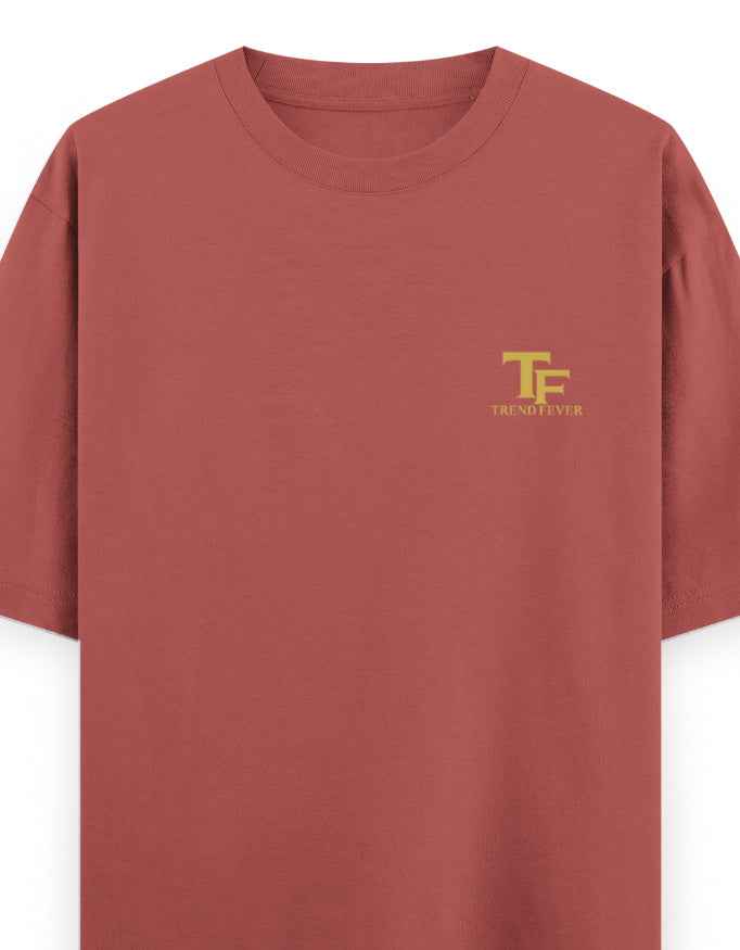 Rust red oversized streetwear t-shirt with yellow TF Trend Fever logo on chest