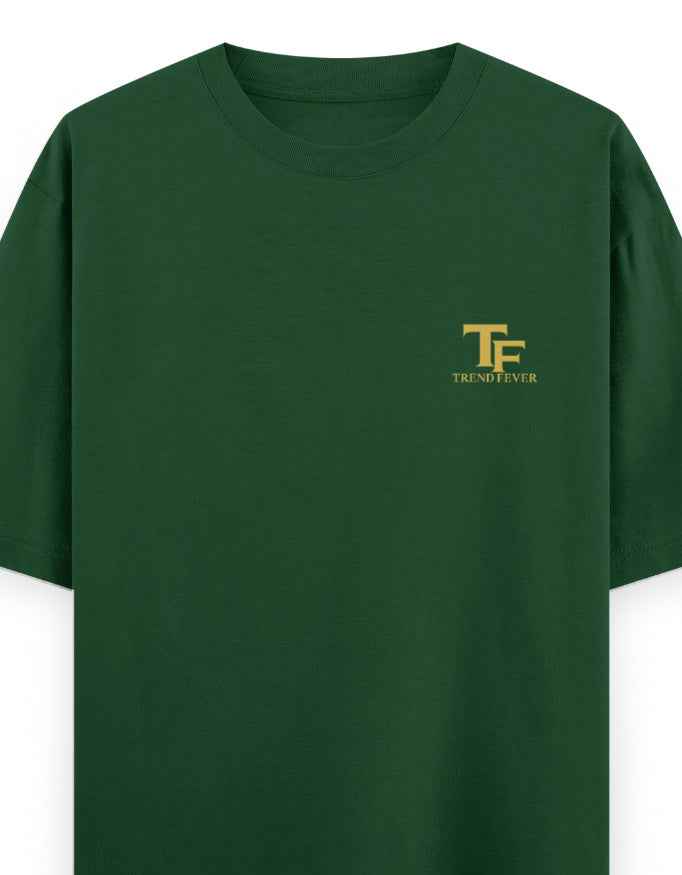 Dark green oversized t-shirt with yellow TF logo on left chest, streetwear style