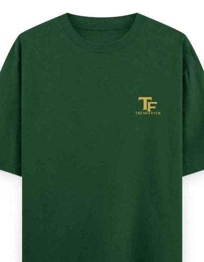 Dark green oversized t-shirt with yellow TF logo on left chest, streetwear style