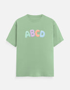 Premium children's casual t-shirt with colorful alphabet print in soft pastel blue by Trend Fever.