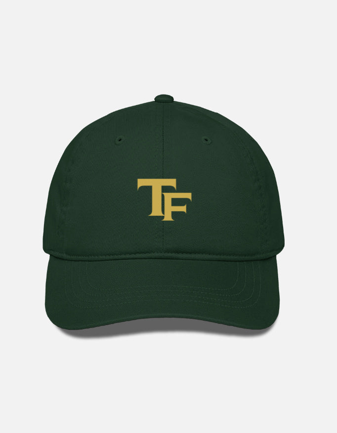 Black cap with Trend Fever logo on a light gray background