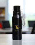 Trend Fever 750 ml black stainless steel water bottle with laser engraved logo, leak-proof insulated design for gym, office, travel, and everyday use.