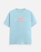 Trend Fever ABC kids cotton t-shirt in pastel blue with colorful alphabet graphic print, soft, breathable fabric for boys, girls and adults.