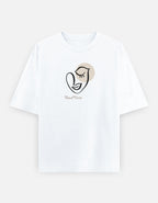 Trend Fever Élan Face oversized T-shirt in white with minimalist abstract face artwork and champagne accent
