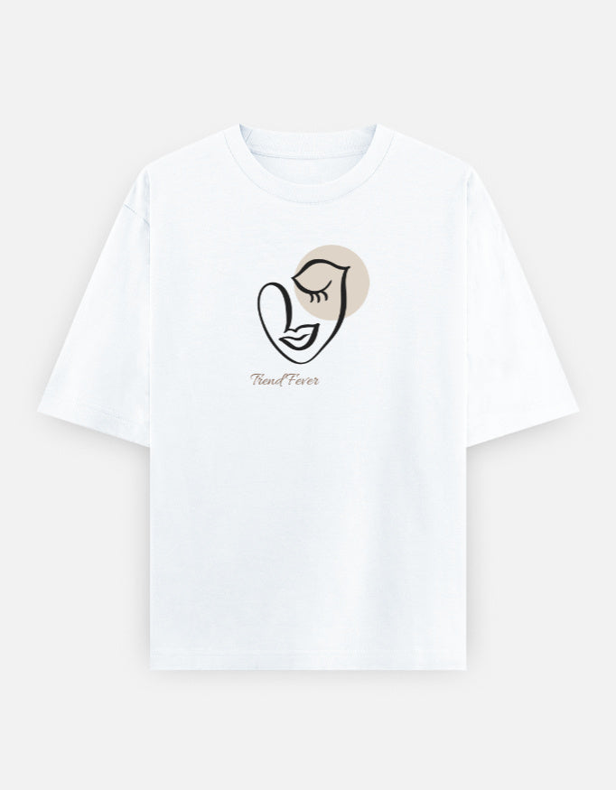 Trend Fever Élan Face oversized T-shirt in white with minimalist abstract face artwork and champagne accent