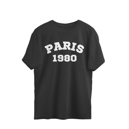 Black oversized t-shirt with bold white 'PARIS 1980' graphic print on front