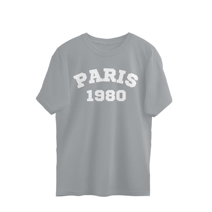 Silver oversized t-shirt with 'PARIS 1980' white graphic on front, streetwear style